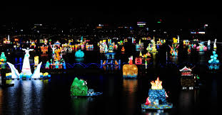 Putting a different kind of lantern that looks like a lotus flower to the Namgang River.